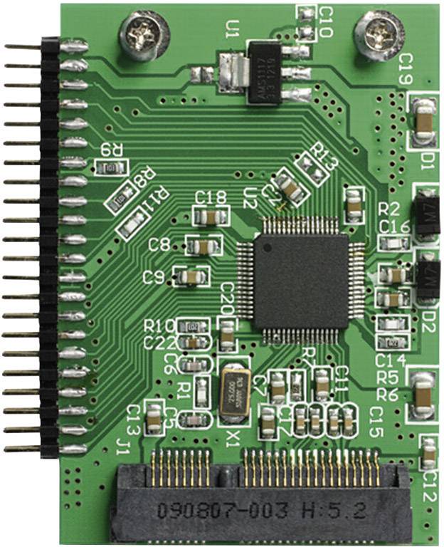 Eine grüne Leiterplatte mit einer Vielzahl von elektronischen Komponenten, darunter ein zentraler Mikrochip und mehrere Kondensatoren.