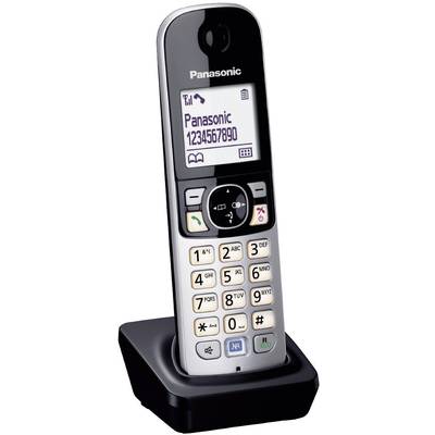 Ein schnurloses Telefon der Marke Panasonic mit digitalem Display, das eine Telefonnummer anzeigt. Es befindet sich in einer Ladeschale.