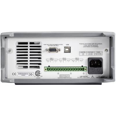 'Rückseite eines elektrischen Geräts mit Lüftungsschlitzen, USB-Anschluss, RS232-Port, Anschlussklemmen und Stromanschluss.'