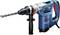 Ein blauer Boschhammer-Bohrhammer mit ergonomischem Griff und Spiralbohrer, ideal für professionelle Bohrarbeiten.