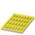 Eine gelbe, rechteckige Halterung für 20 Bohrer, geordnet in fünf Reihen.