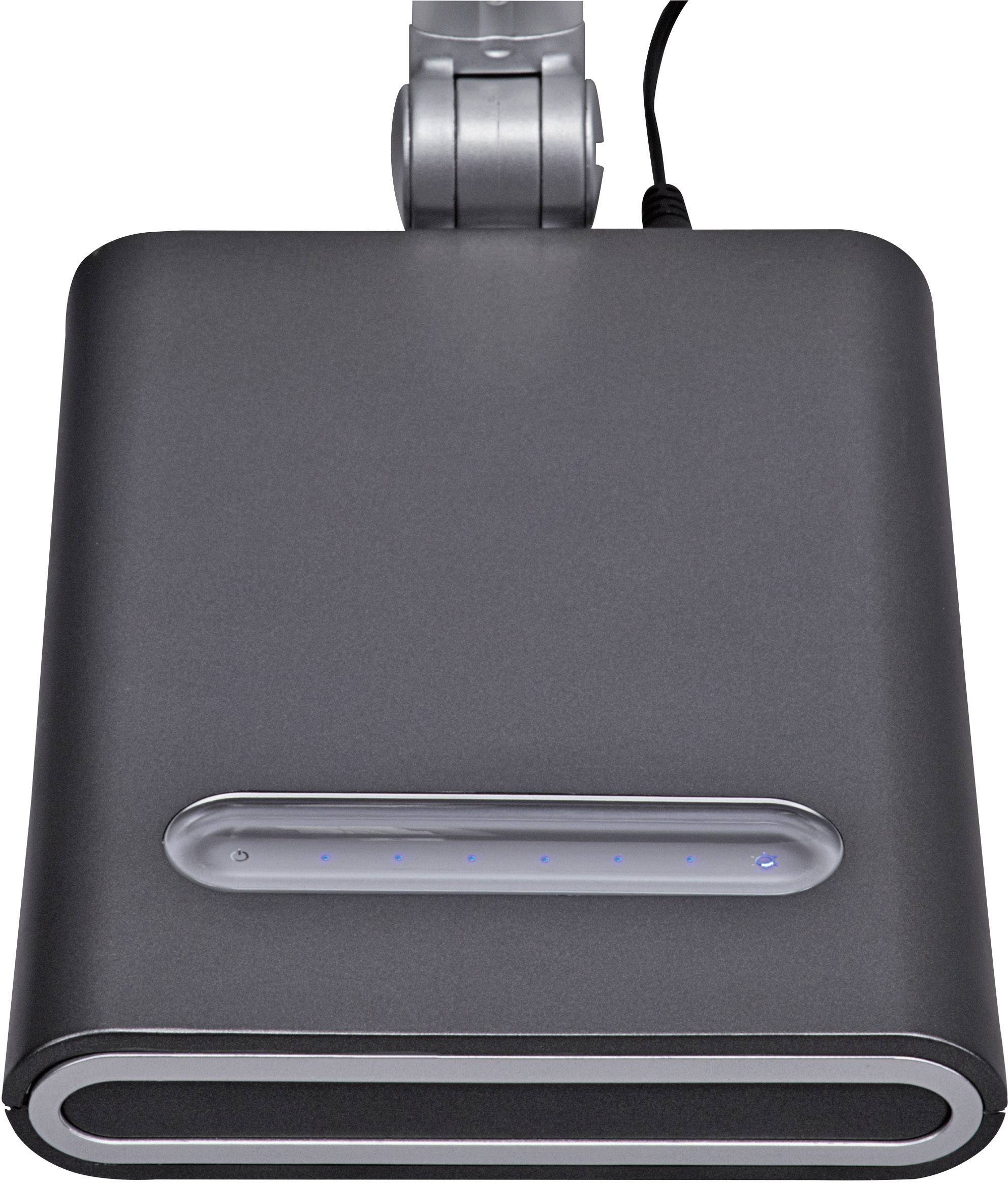 Ein schwarzes, rechteckiges Gerät mit LED-Anzeigen auf der Oberfläche. Es ist an ein Kabel angeschlossen und scheint ein Ladegerät zu sein.