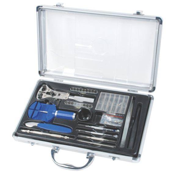 'Offenes silbernes Etui mit Uhrmacherwerkzeug: Lupen, Uhrhalter, Pinzetten, Schraubendreher. Ideal zum Reparieren von Uhren.'