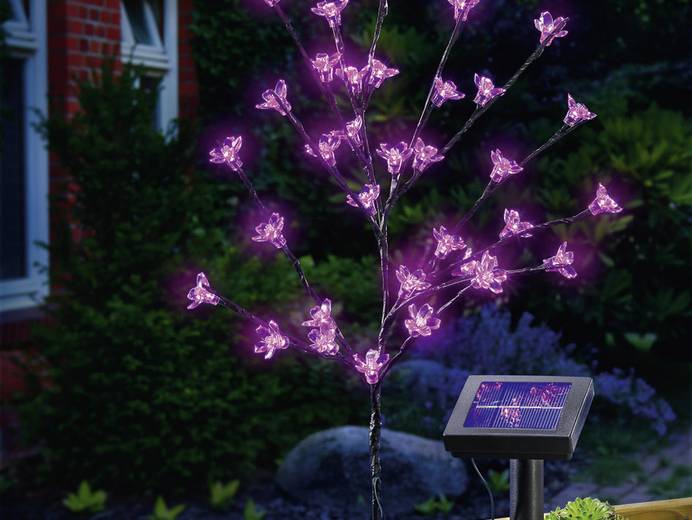Un buisson lumineux solaire est flexible, dont les fleurs peuvent clignoter ou éclairer en continu