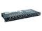 'DMX 6X' DMX-Splitter-Gerät mit mehreren XLR-Anschlüssen für DMX-Signale. Schwarzes Gehäuse, Rack-kompatibel, wird für Lichtsteuerung verwendet.