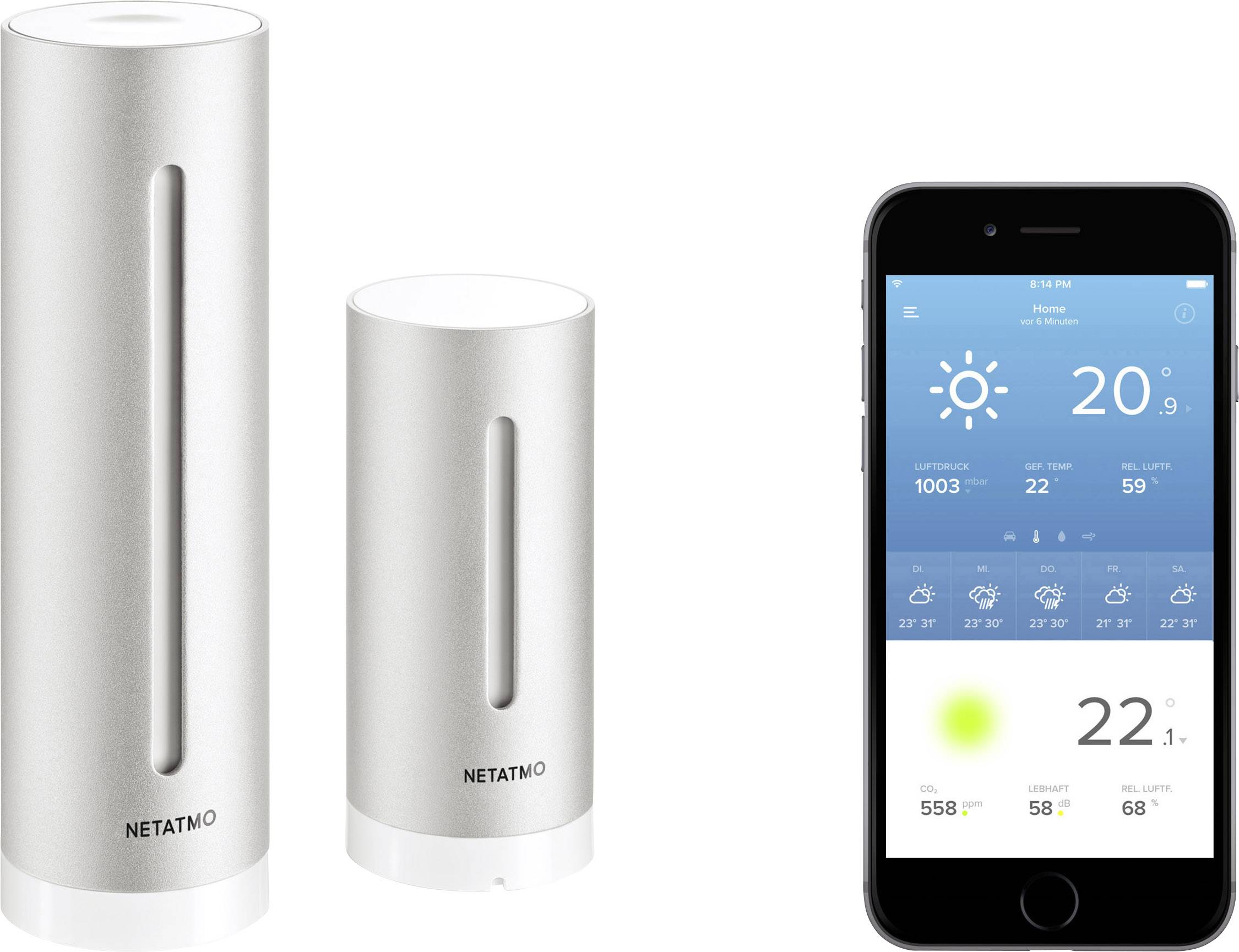 Zwei silberne Wetterstation-Sensoren neben einem Smartphone, das eine Wetter-App anzeigt. Temperatur 20°C, Luftfeuchtigkeit 59%.