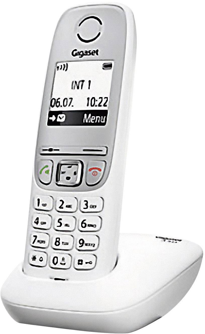 Ein weißes, schnurloses DECT-Telefon auf einer Ladestation, mit Displayanzeige von Datum '06.07.' und Uhrzeit '10:22'.