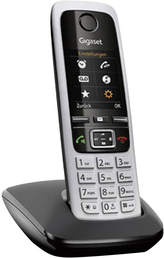 Kabelloses DECT-Telefon mit Farbdisplay und Tastenfeld, auf Ladestation stehend, geeignet für Anrufe und Einstellungen im Menü.