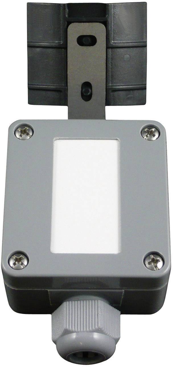 Ein graues rechteckiges Gerät mit vier Schrauben an den Ecken und einem schwarzen Befestigungselement.