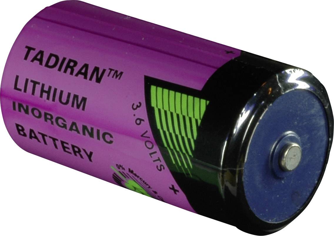 Eine lilafarbene Lithiumbatterie der Marke Tadiran mit der Aufschrift '3.6 Volts' und 'Inorganic Battery'.