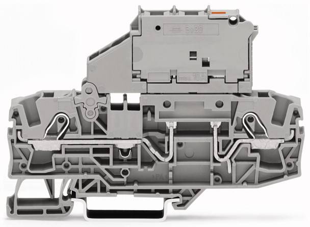 Eine graue, technische Komponente aus Kunststoff mit komplexer interner Struktur, möglicherweise ein Bauteil für elektrische Verbindungen.