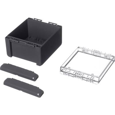 Schwarze Kunststoffbox mit abnehmbarem transparenten Deckel, daneben zwei schwarze Abdeckungen; Komponenten eines modularen Systems.