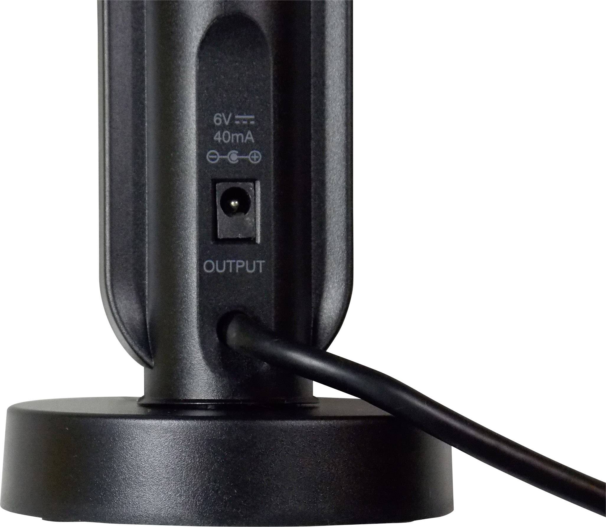 'Output'-Buchse auf einem schwarzen Standfuß, verbunden mit einem Netzkabel. Oben steht '6V -- 40mA'.