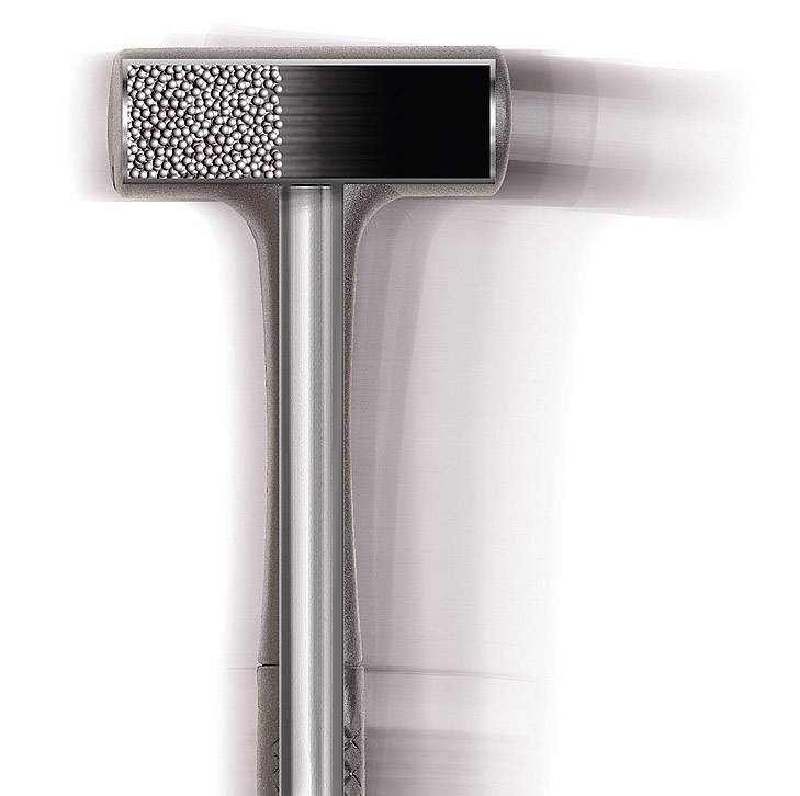 Ein Hammer mit beweglichem Kopf und Metallkügelchen im Inneren, zeigt die Dämpfung der Schläge durch die Bewegung der Kügelchen.