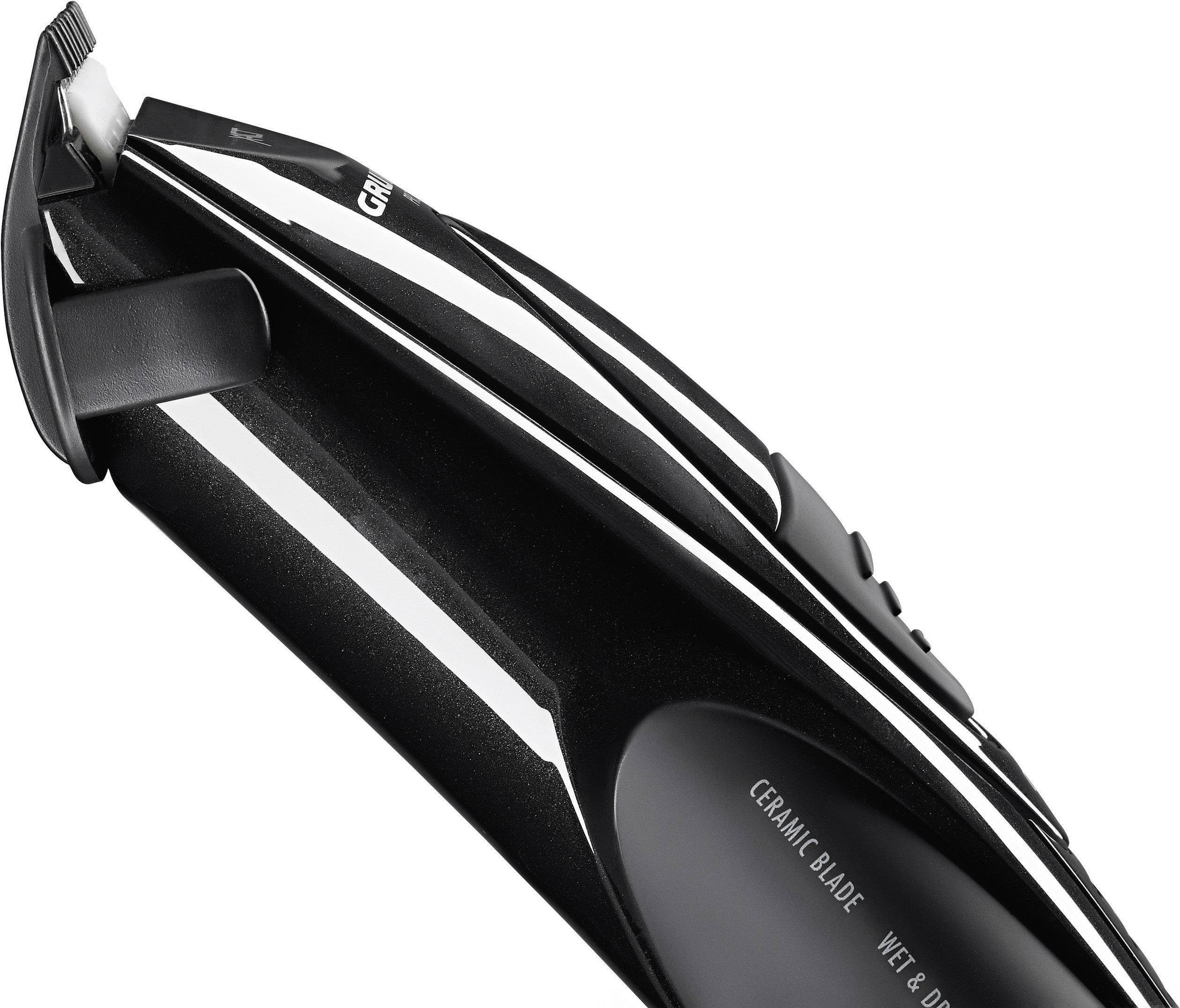 Elektrischer Haarschneider mit schwarzem Gehäuse, keramischer Klinge und Wet&Dry-Technologie.