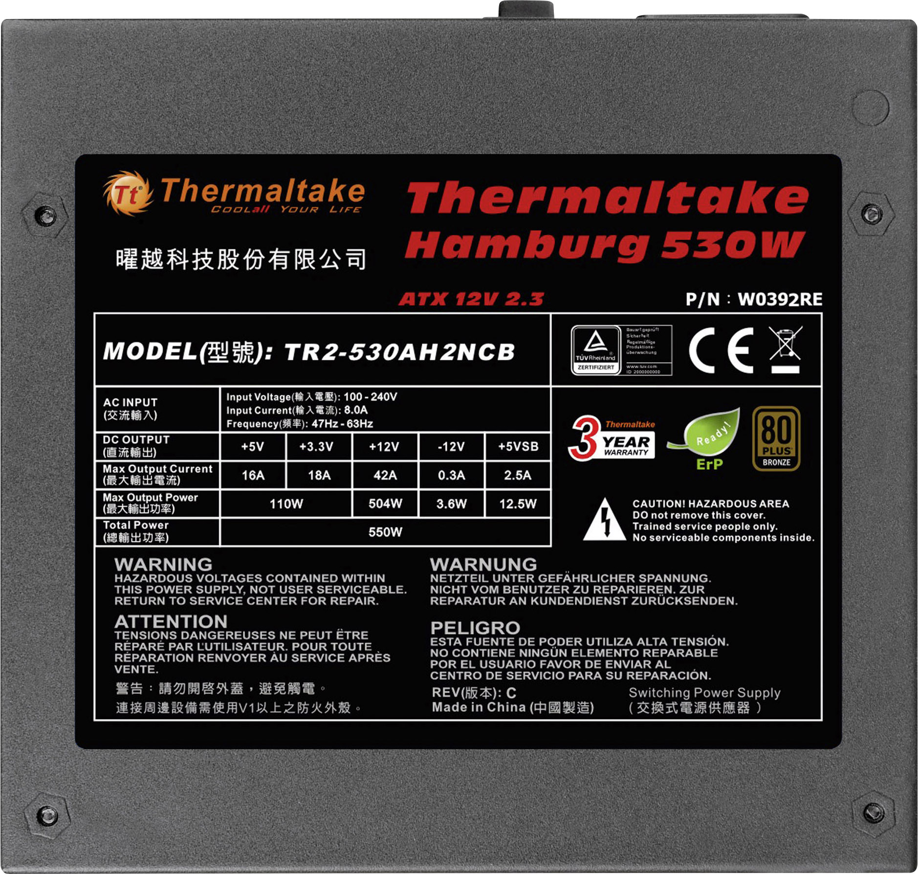 'Schwarz-graues Netzteil, Modellname: Thermaltake Hamburg 530W. Technische Daten und Warnhinweise in mehreren Sprachen.'