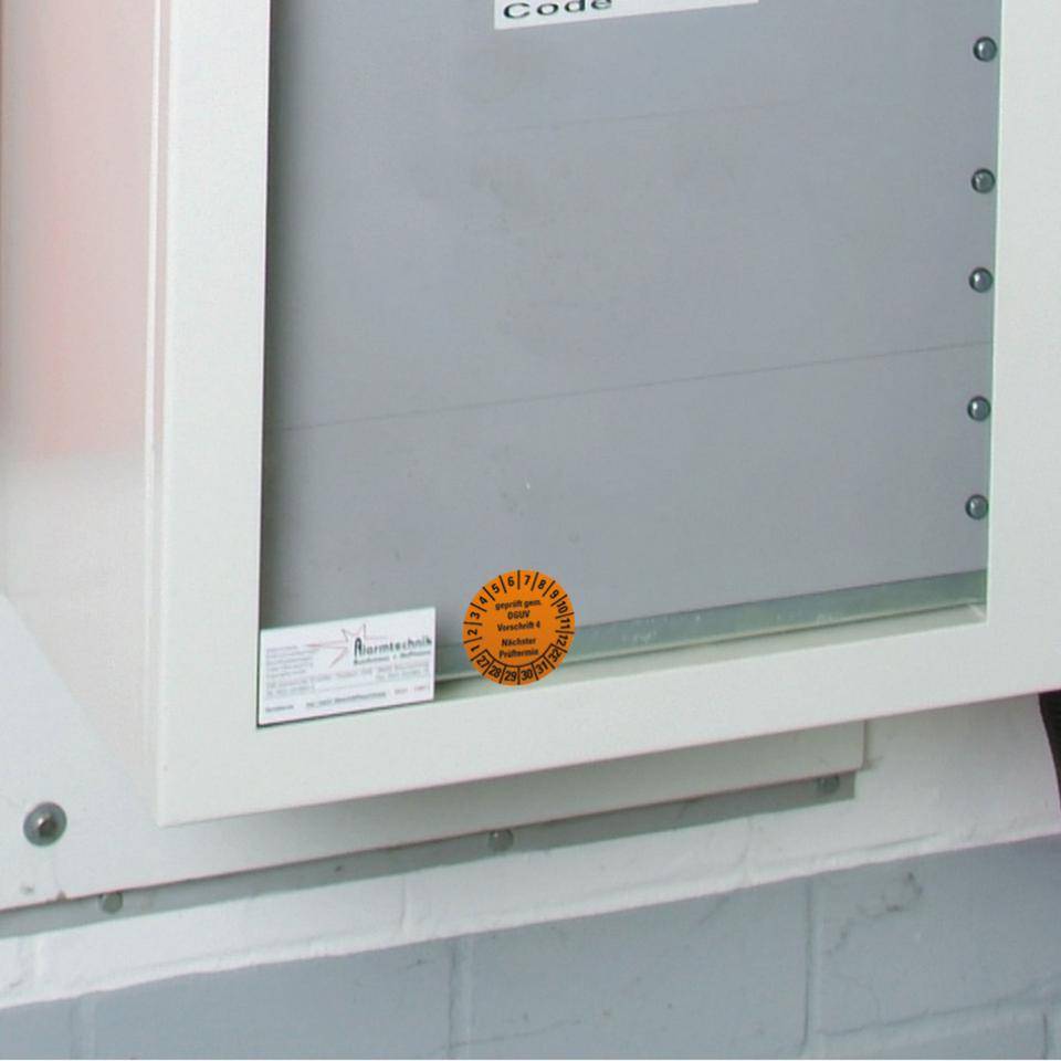 Prüfplakette Geprüft gemäß DGUV Vorschrift 4, 27-32, orange, Dokumentenfolie, Ø30mm, 18/BOG-2