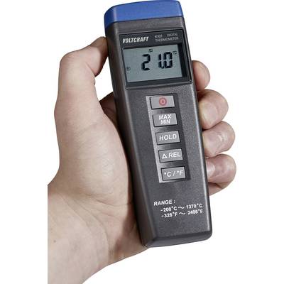 Hand holding a digital thermometer displaying '210°C', with buttons labeled 'MAX/MIN', 'HOLD', 'Δ REL', and a switch for '°C/°F'.