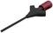 A black cable with a red plastic insulation shows an electronic or electrical connecting device.