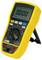 A yellow digital multimeter displays 0.000 V. It has several buttons and selection dials for choosing measurement ranges and modes.