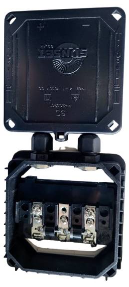 Electrical connection box with an open lid, showing three terminals for electrical connections.