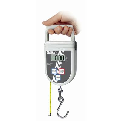 A hand is holding an electronic hanging scale with a digital display and hook. The display shows '0.00'.
