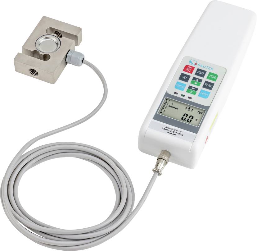 Force gauge with digital display shows '0.0'. Connected is a flat metal force sensor with a round centre, suitable for force testing.
