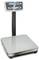 Digital scales with an electronic display showing '0.0 kg'. It stands on a metal frame, suitable for weighing objects.