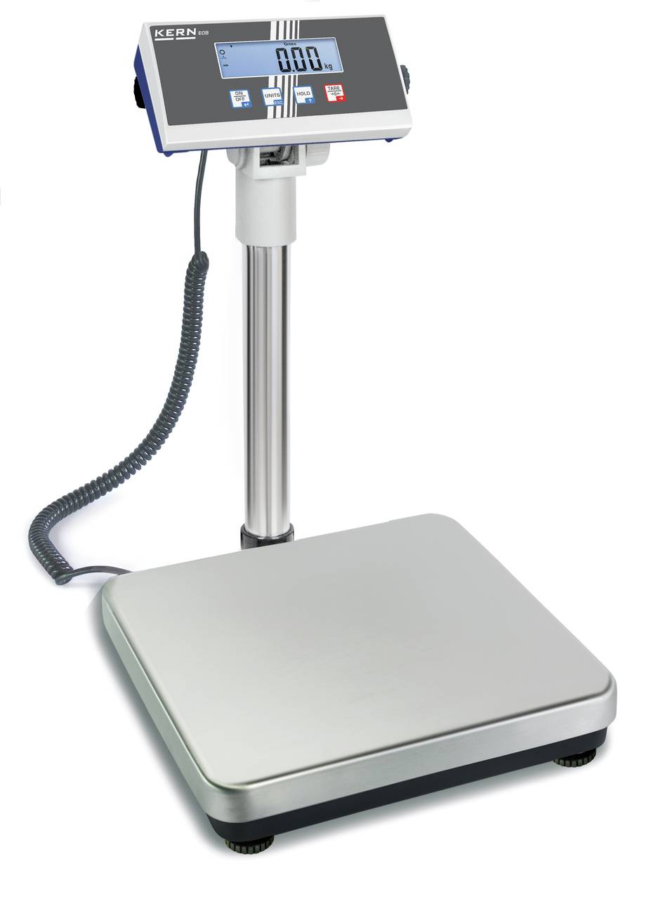 Digital scale with stainless steel platform, mounted on a column, displaying the measurement result on a screen. Suitable for industrial applications.