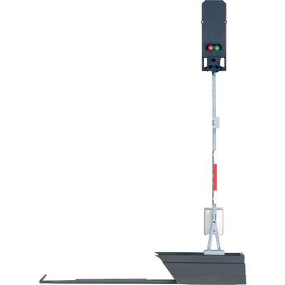 A railway signal shows a green and a red light. The signal is mounted on a grey mast with red markings.