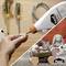 A divided image shows a hand applying glue to a wooden piece on the left, and on the right, a decorative Easter cart with eggs and a bunny.