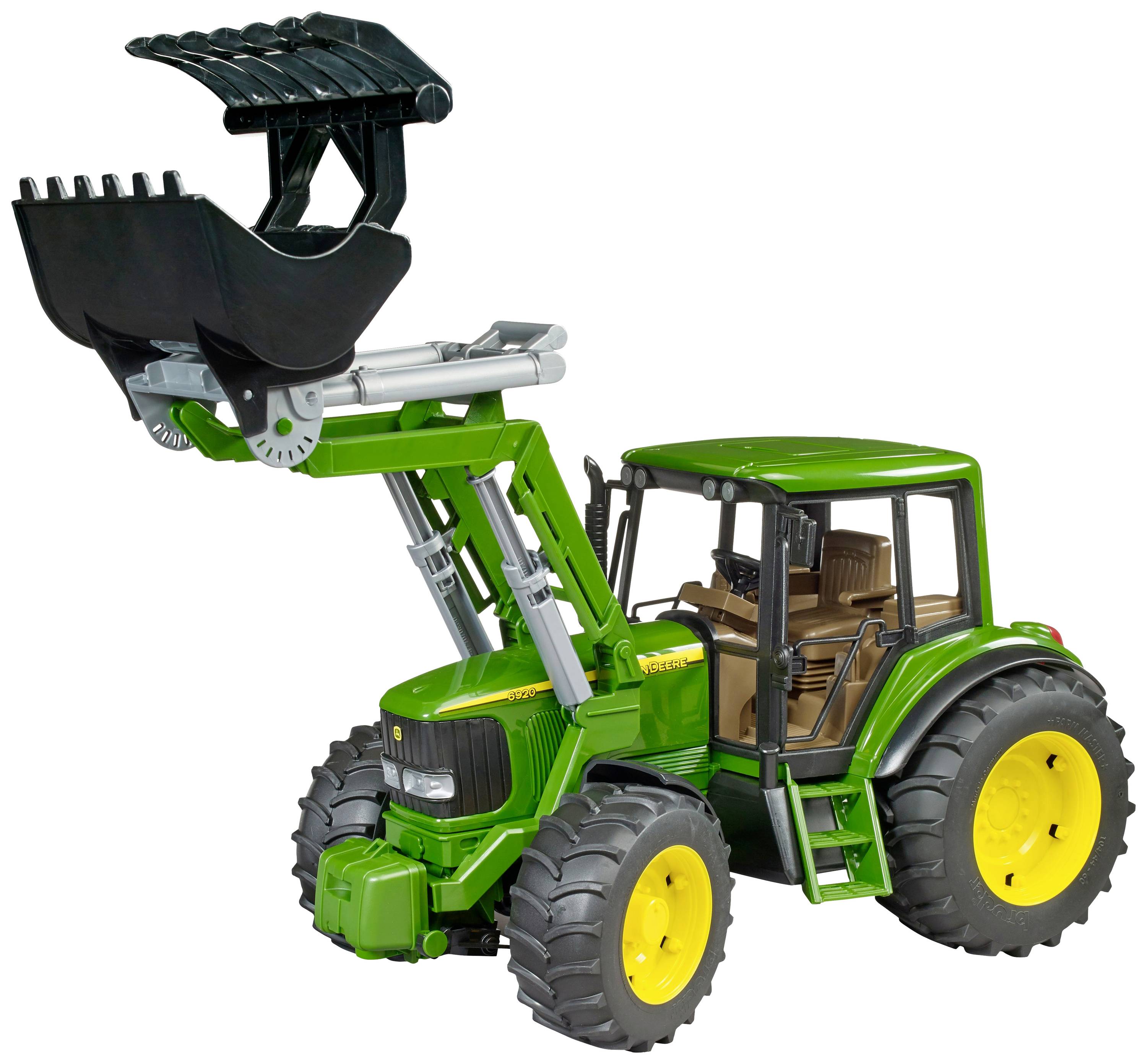 A green toy tractor with yellow wheels and a movable front loader bucket, depicted against a white background.