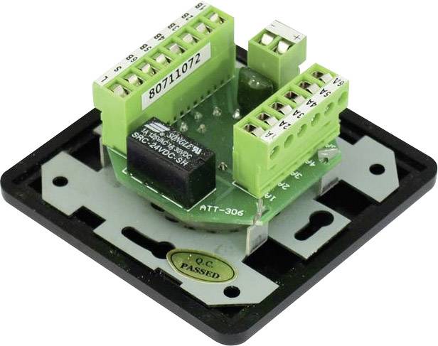Green electrical terminal block on a black base, with labels for positive and negative poles.