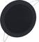 A black, round speaker with a metal frame is shown.