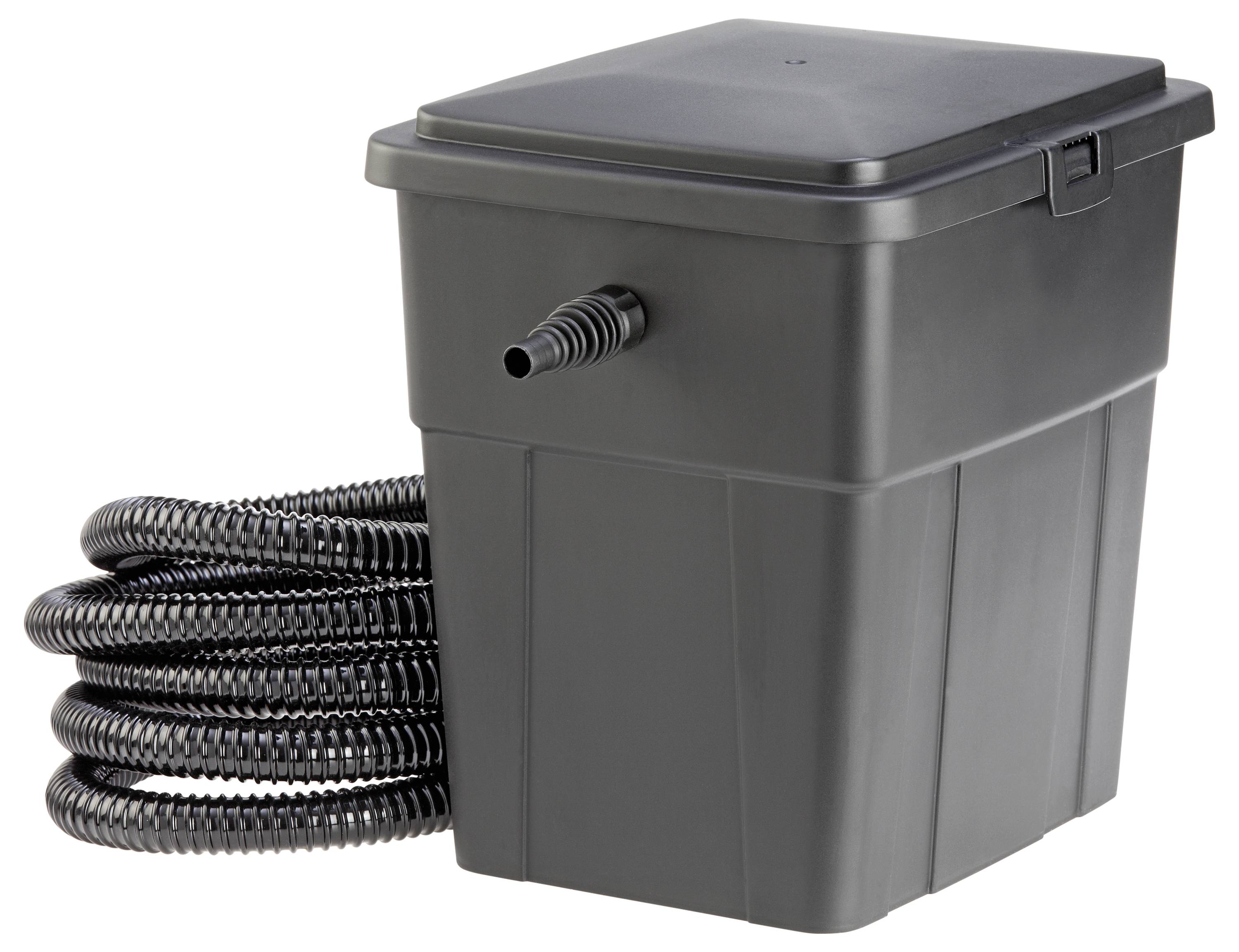 Black plastic pond filter with a hose coiled beside it.
