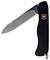 A black folding knife with an open stainless steel blade and an emblem of a white cross on a red background on the handle.