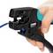 'A hand using a wire stripping tool to remove insulation from a blue wire, revealing the copper wire inside.'