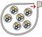 Diagram shows five circular bundles, consisting of small rings, within a cable sheath. Arrow indicates the direction of the cable.
