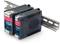 Two black TRACO POWER power supplies are mounted on a metal DIN rail. They have red and blue labelling and are used for power supply.