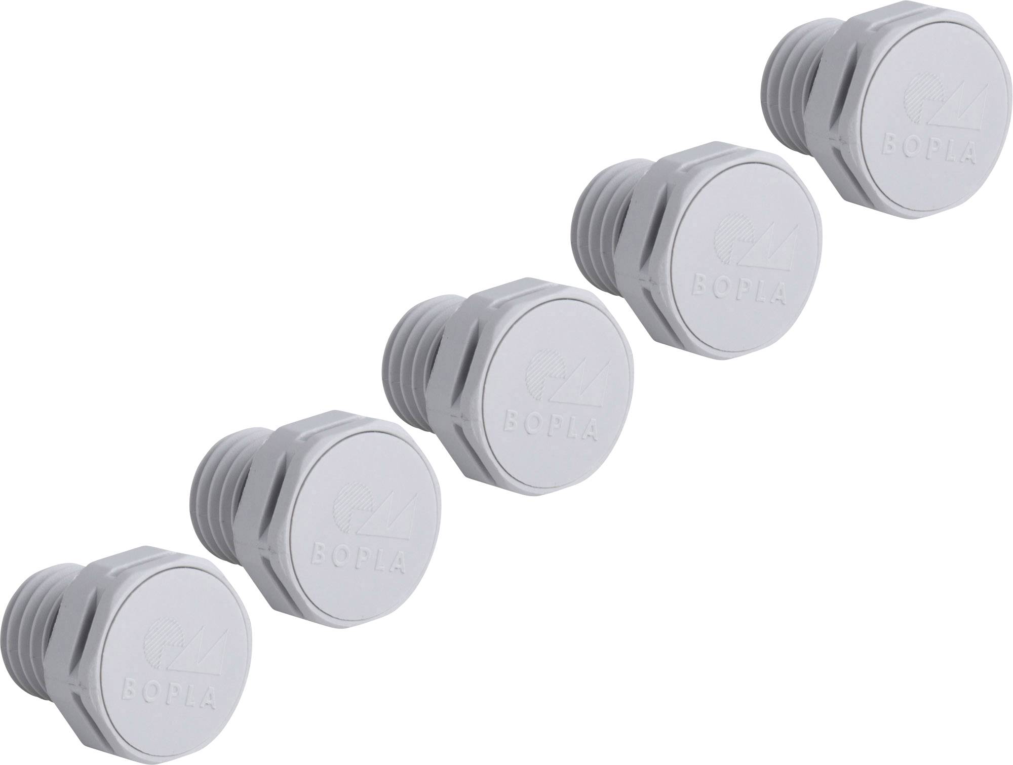 Five white plastic hexagonal stoppers lying side by side.