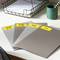 Four labelled folders with the titles 'Campaign Jan-Jun', 'Campaign Jul-Dec', 'Budget' and 'To-Do List' are lying on a desk.