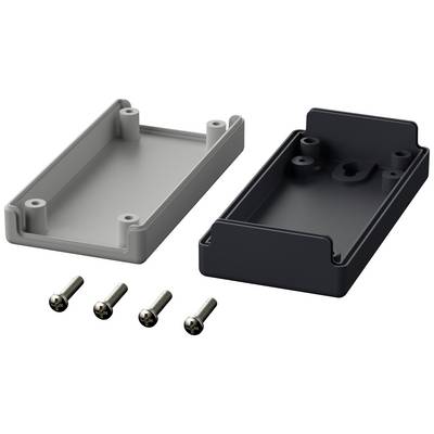 Two rectangular housing parts, one in grey and one in black, are lying open side by side. Four screws are visible.