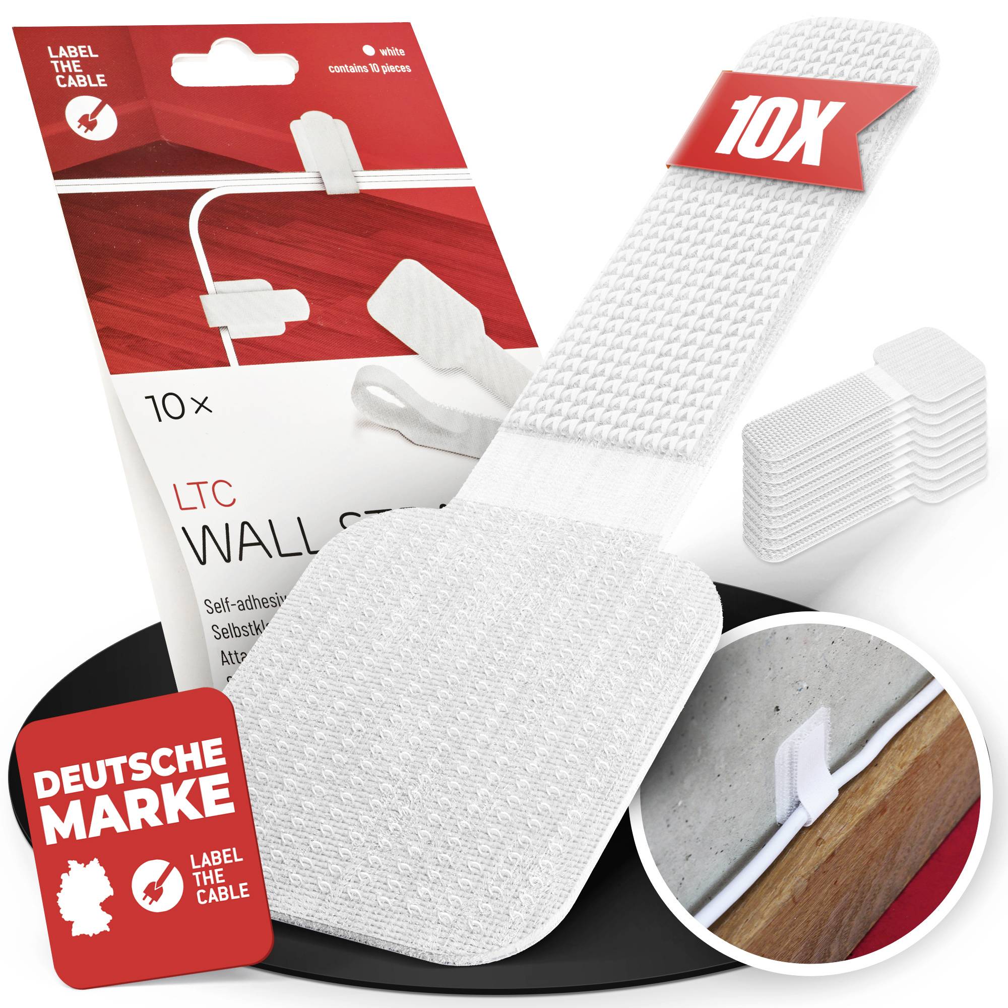 Product image of white self-adhesive cable wall clips and labels, shown with retail packaging, a '10X' marker, and a close-up of a clip securing a cable to a wall.