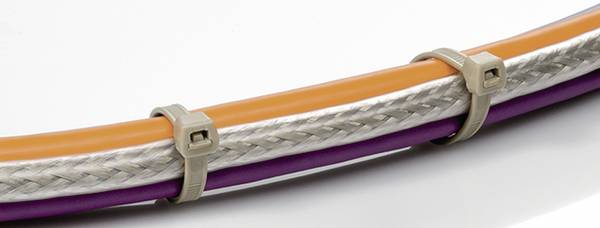Several cables, including an orange and a purple one, are tightly wrapped with metal braiding and secured by cable ties.