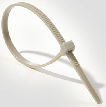 A beige plastic cable tie in a closed loop with a toothed surface and a locking head.