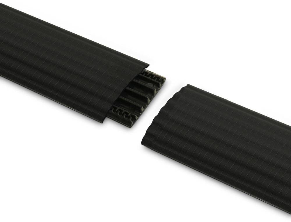 Two black spiral springs with a ribbed surface are aligned but slightly separated. They appear to be about to be joined together.