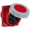 Industrial socket with a red housing and grey protective cover, suitable for electrical connections in industrial environments.