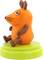 An orange-brown vinyl toy in the shape of a seated mouse with large eyes and black lines for facial features, mounted on a green base.