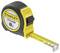 A yellow and black Stanley tape measure, 8 metres in length. The measuring scale is partially extended.