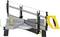 A mitre saw with a yellow handle, grey base and angle scale, suitable for precise cuts in woodworking.